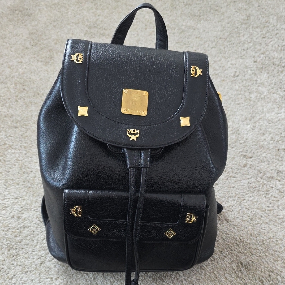 MCM Black Leather Backpack with Gold Accents
